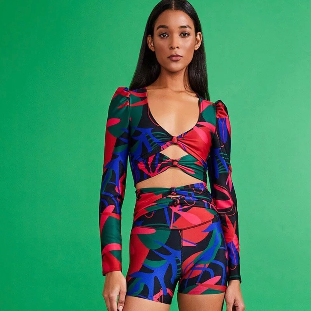 PATBO This Long Sleeve Cut-Out Top is perfect to work out or wear out.